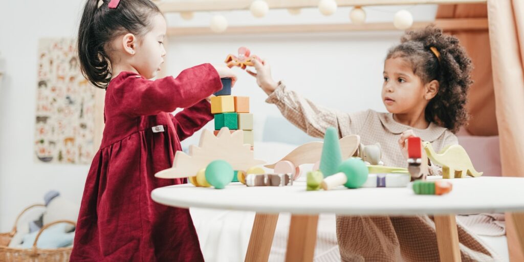 little girls playing in school