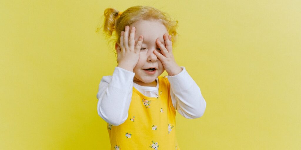 little girl with pigtails