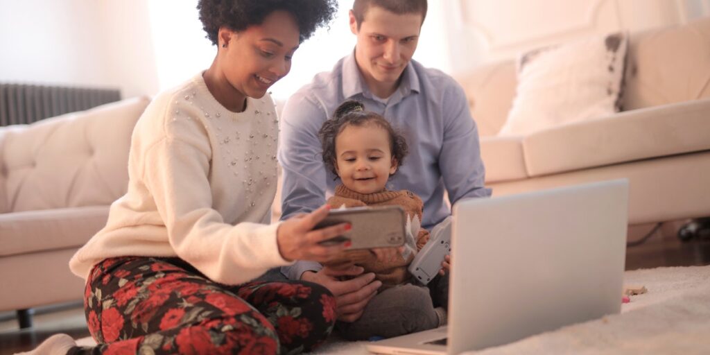 family looking at computer