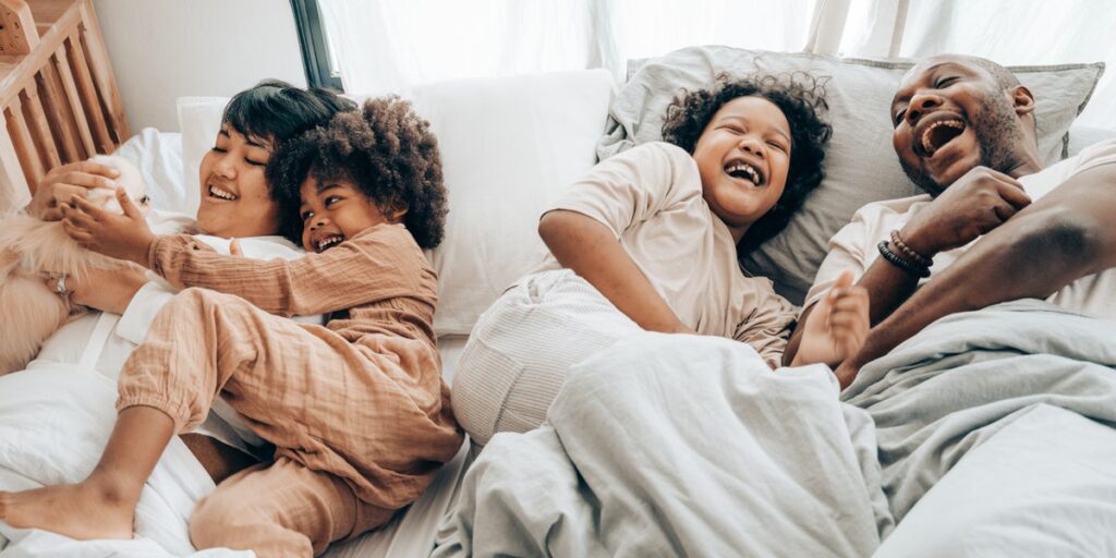 family together in bed