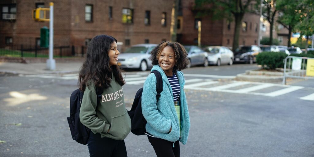 two girls walking to school