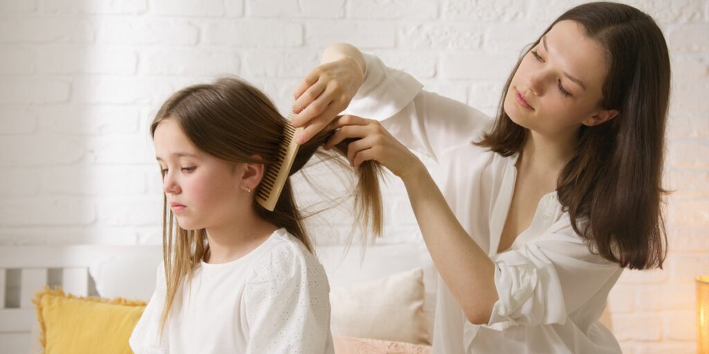 brush child's hair