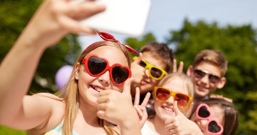 Group of kids taking a selfie